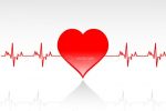Cardiogram and Red Heart on White Background